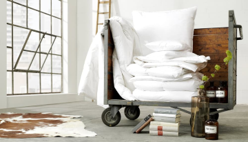 Synthetische vs Natürliche Bettdecken Symbolbild