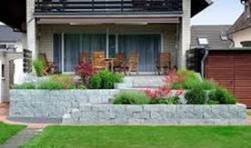 Terrasse komfortabel und pflegeleicht gestalten Symbolbild